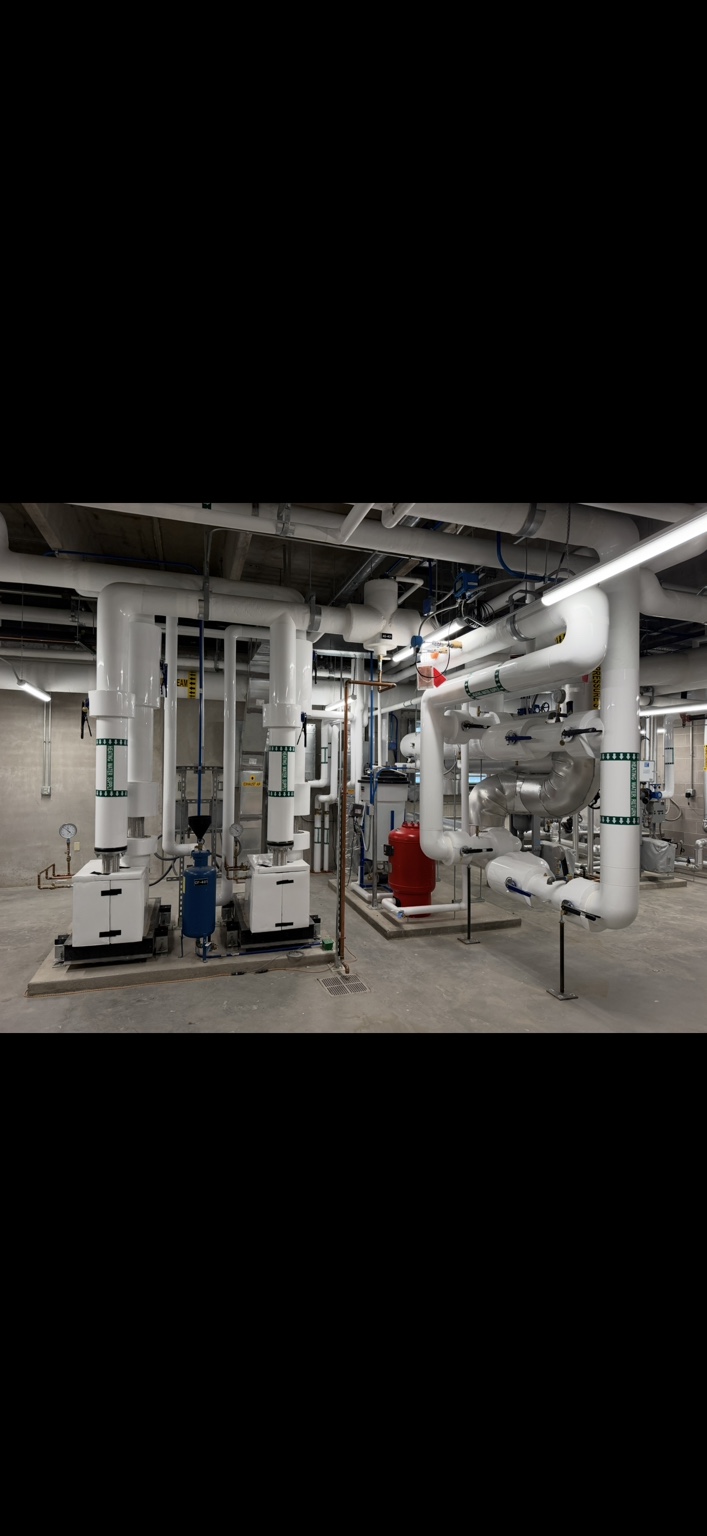Commercial mechanical room piping by E&J Plumbing