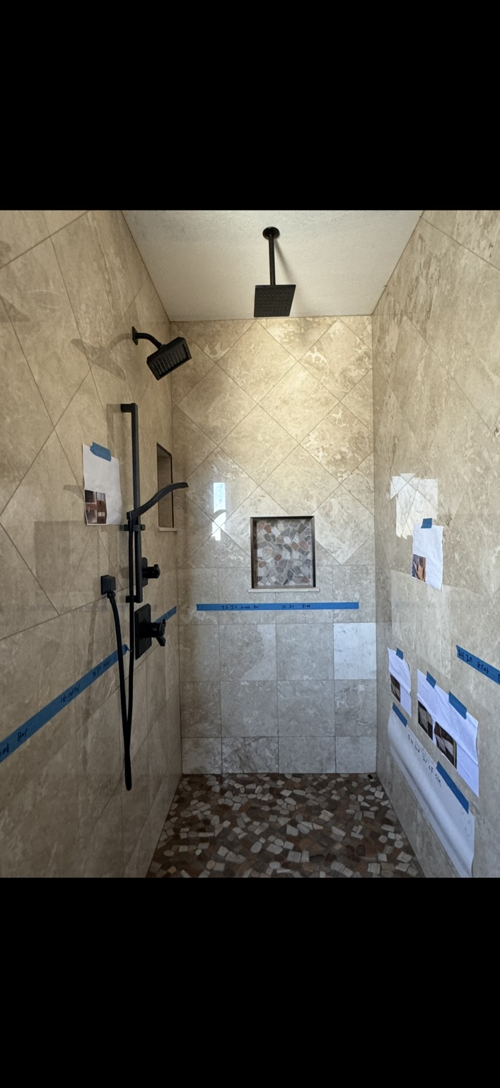Residential shower installation by E&J Plumbing